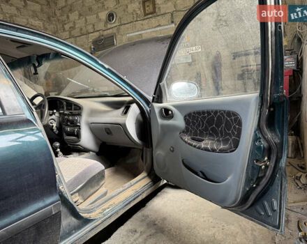 Зеленый Дэу Ланос, объемом двигателя 1.5 л и пробегом 104 тыс. км за 1850 $, фото 6 на Automoto.ua