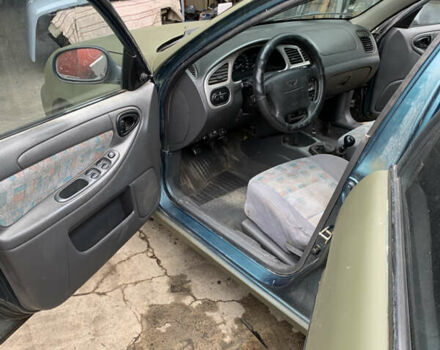 Зелений Деу Ланос, об'ємом двигуна 1.6 л та пробігом 248 тис. км за 2500 $, фото 9 на Automoto.ua