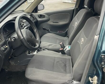 Зеленый Дэу Ланос, объемом двигателя 1.5 л и пробегом 400 тыс. км за 1450 $, фото 5 на Automoto.ua