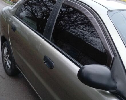 Зеленый Дэу Ланос, объемом двигателя 1.5 л и пробегом 255 тыс. км за 1774 $, фото 4 на Automoto.ua