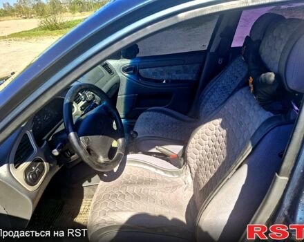 Зеленый Дэу Ланос, объемом двигателя 1.6 л и пробегом 260 тыс. км за 3100 $, фото 5 на Automoto.ua