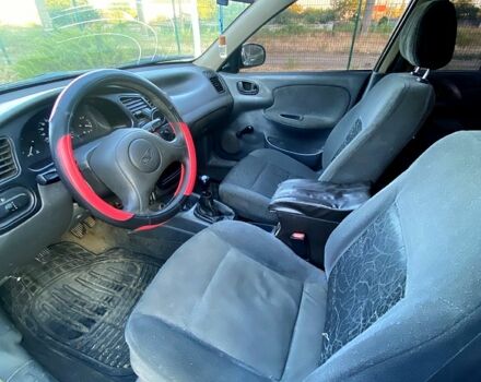 Зеленый Дэу Ланос, объемом двигателя 1.5 л и пробегом 264 тыс. км за 950 $, фото 7 на Automoto.ua