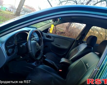 Зеленый Дэу Ланос, объемом двигателя 1.5 л и пробегом 203 тыс. км за 2500 $, фото 6 на Automoto.ua