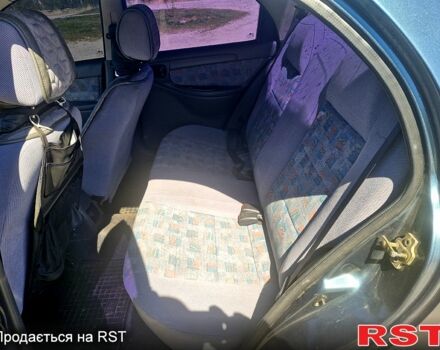 Зеленый Дэу Ланос, объемом двигателя 1.6 л и пробегом 260 тыс. км за 3100 $, фото 4 на Automoto.ua