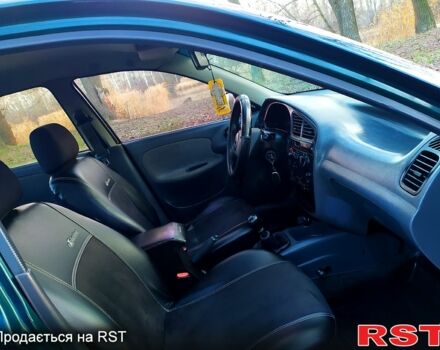 Зеленый Дэу Ланос, объемом двигателя 1.5 л и пробегом 203 тыс. км за 2500 $, фото 8 на Automoto.ua