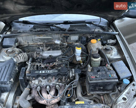 Зеленый Дэу Ланос, объемом двигателя 1.5 л и пробегом 335 тыс. км за 1300 $, фото 11 на Automoto.ua