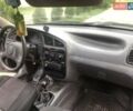 Зеленый Дэу Ланос, объемом двигателя 1.5 л и пробегом 186 тыс. км за 2000 $, фото 3 на Automoto.ua
