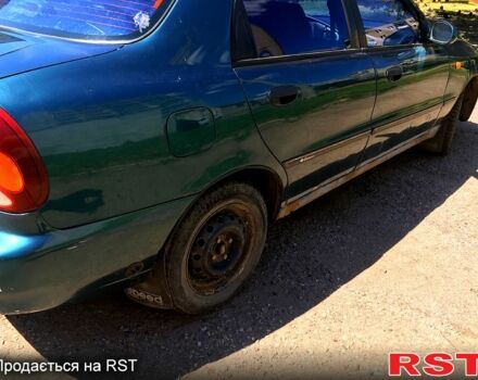 Зелений Деу Ланос, об'ємом двигуна 1.6 л та пробігом 215 тис. км за 1300 $, фото 5 на Automoto.ua