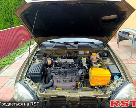 Зеленый Дэу Ланос, объемом двигателя 1.5 л и пробегом 351 тыс. км за 2350 $, фото 7 на Automoto.ua