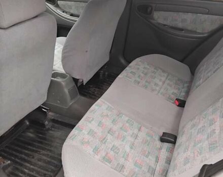 Зеленый Дэу Ланос, объемом двигателя 1.6 л и пробегом 165 тыс. км за 2400 $, фото 3 на Automoto.ua