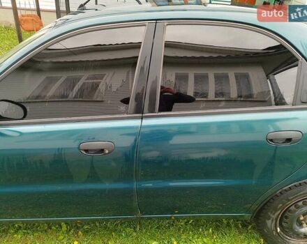 Зеленый Дэу Ланос, объемом двигателя 1.5 л и пробегом 240 тыс. км за 2300 $, фото 3 на Automoto.ua