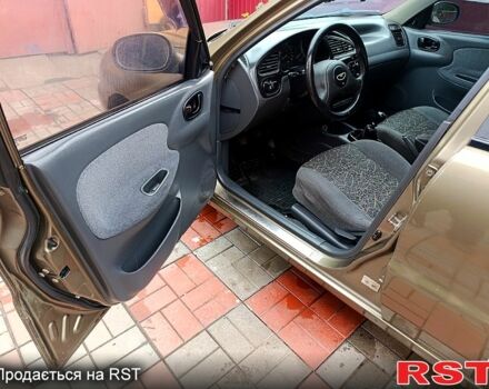 Зеленый Дэу Ланос, объемом двигателя 1.5 л и пробегом 351 тыс. км за 2350 $, фото 4 на Automoto.ua