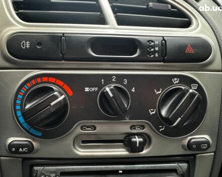 Зелений Деу Ланос, об'ємом двигуна 1.6 л та пробігом 191 тис. км за 2690 $, фото 14 на Automoto.ua