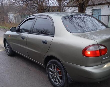 Зеленый Дэу Ланос, объемом двигателя 1.5 л и пробегом 255 тыс. км за 1774 $, фото 2 на Automoto.ua