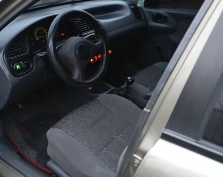 Зеленый Дэу Ланос, объемом двигателя 1.5 л и пробегом 255 тыс. км за 1774 $, фото 8 на Automoto.ua