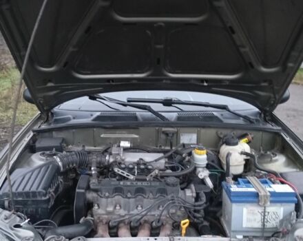 Зеленый Дэу Ланос, объемом двигателя 1.5 л и пробегом 255 тыс. км за 1774 $, фото 9 на Automoto.ua