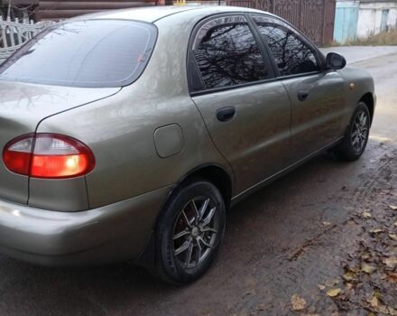 Зеленый Дэу Ланос, объемом двигателя 1.5 л и пробегом 255 тыс. км за 1774 $, фото 3 на Automoto.ua