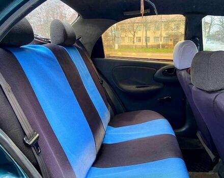 Зеленый Дэу Ланос, объемом двигателя 1.6 л и пробегом 150 тыс. км за 1450 $, фото 7 на Automoto.ua