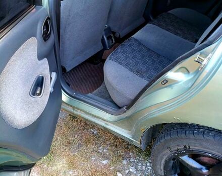 Зеленый Дэу Ланос, объемом двигателя 1.5 л и пробегом 184 тыс. км за 1900 $, фото 6 на Automoto.ua