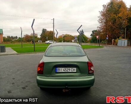 Зеленый Дэу Ланос, объемом двигателя 1.5 л и пробегом 350 тыс. км за 1450 $, фото 4 на Automoto.ua