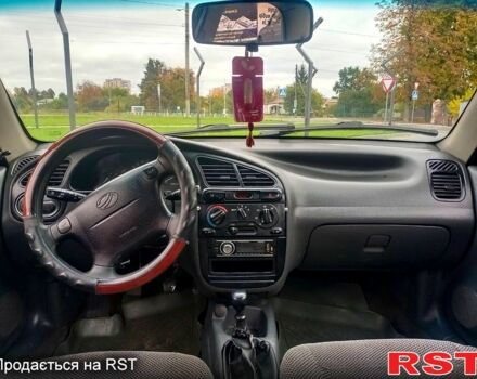 Зеленый Дэу Ланос, объемом двигателя 1.5 л и пробегом 350 тыс. км за 1450 $, фото 5 на Automoto.ua