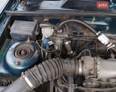 Зелений Деу Ланос, об'ємом двигуна 1.5 л та пробігом 215 тис. км за 2400 $, фото 19 на Automoto.ua