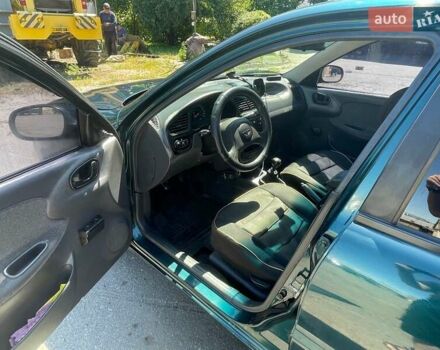 Зеленый Дэу Ланос, объемом двигателя 1.5 л и пробегом 290 тыс. км за 2550 $, фото 5 на Automoto.ua