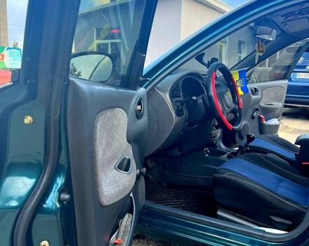 Зеленый Дэу Ланос, объемом двигателя 1.5 л и пробегом 185 тыс. км за 2200 $, фото 5 на Automoto.ua