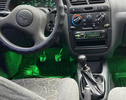 Зеленый Дэу Ланос, объемом двигателя 1.5 л и пробегом 270 тыс. км за 2000 $, фото 6 на Automoto.ua