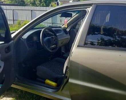 Зеленый Дэу Ланос, объемом двигателя 1.5 л и пробегом 205 тыс. км за 2500 $, фото 4 на Automoto.ua