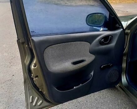 Зеленый Дэу Ланос, объемом двигателя 1.5 л и пробегом 130 тыс. км за 2000 $, фото 5 на Automoto.ua