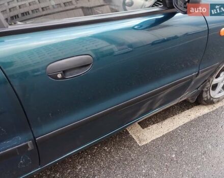 Зелений Деу Ланос, об'ємом двигуна 1.5 л та пробігом 215 тис. км за 2400 $, фото 12 на Automoto.ua