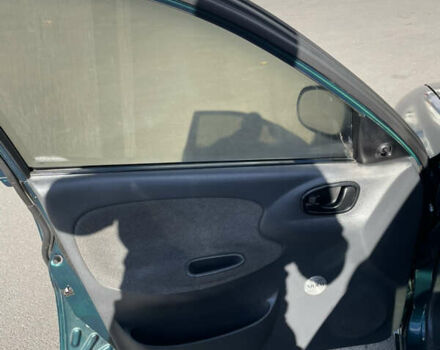 Зеленый Дэу Ланос, объемом двигателя 1.5 л и пробегом 149 тыс. км за 2050 $, фото 8 на Automoto.ua