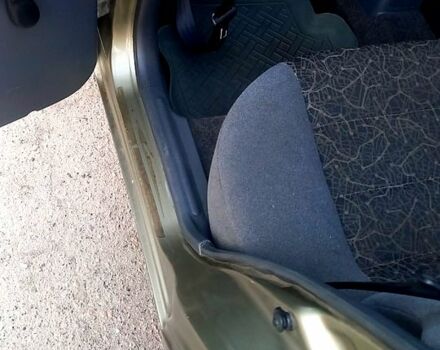 Зеленый Дэу Ланос, объемом двигателя 1.5 л и пробегом 130 тыс. км за 2000 $, фото 4 на Automoto.ua