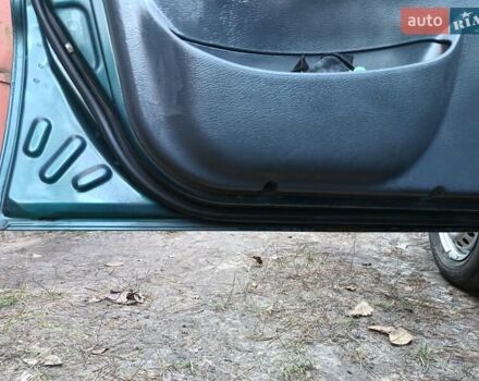 Зелений Деу Ланос, об'ємом двигуна 1.5 л та пробігом 293 тис. км за 1800 $, фото 11 на Automoto.ua