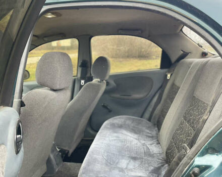 Зелений Деу Ланос, об'ємом двигуна 1.35 л та пробігом 256 тис. км за 1499 $, фото 15 на Automoto.ua