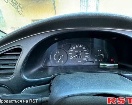 Зеленый Дэу Ланос, объемом двигателя 1.5 л и пробегом 33 тыс. км за 2200 $, фото 5 на Automoto.ua