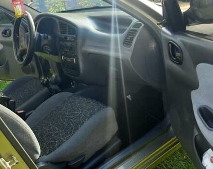 Зеленый Дэу Ланос, объемом двигателя 1.5 л и пробегом 205 тыс. км за 2500 $, фото 10 на Automoto.ua