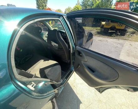 Зеленый Дэу Ланос, объемом двигателя 1.5 л и пробегом 290 тыс. км за 2550 $, фото 8 на Automoto.ua