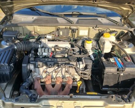 Зеленый Дэу Ланос, объемом двигателя 1.5 л и пробегом 170 тыс. км за 3300 $, фото 16 на Automoto.ua