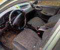 Зеленый Дэу Ланос, объемом двигателя 1.5 л и пробегом 220 тыс. км за 2000 $, фото 6 на Automoto.ua