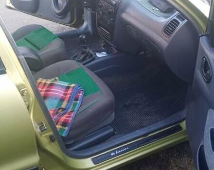 Зеленый Дэу Ланос, объемом двигателя 1.5 л и пробегом 219 тыс. км за 3000 $, фото 5 на Automoto.ua