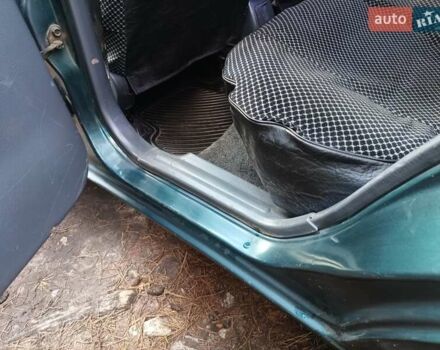 Зелений Деу Ланос, об'ємом двигуна 1.5 л та пробігом 293 тис. км за 1800 $, фото 8 на Automoto.ua
