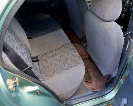 Зеленый Дэу Ланос, объемом двигателя 1.5 л и пробегом 184 тыс. км за 1900 $, фото 8 на Automoto.ua