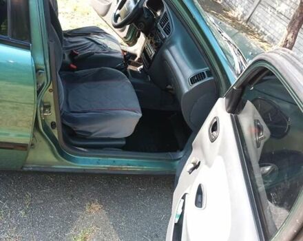 Зеленый Дэу Ланос, объемом двигателя 1.5 л и пробегом 183 тыс. км за 3500 $, фото 11 на Automoto.ua