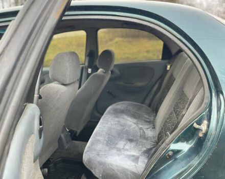 Зелений Деу Ланос, об'ємом двигуна 1.35 л та пробігом 256 тис. км за 1499 $, фото 14 на Automoto.ua