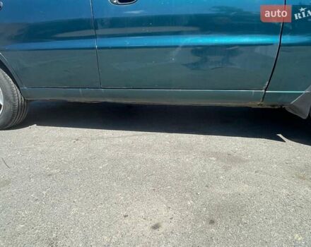 Зеленый Дэу Ланос, объемом двигателя 1.5 л и пробегом 290 тыс. км за 2550 $, фото 4 на Automoto.ua