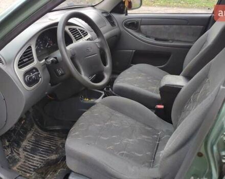 Зеленый Дэу Ланос, объемом двигателя 1.6 л и пробегом 228 тыс. км за 2100 $, фото 11 на Automoto.ua