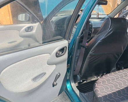 Зеленый Дэу Ланос, объемом двигателя 1.5 л и пробегом 254 тыс. км за 3200 $, фото 8 на Automoto.ua