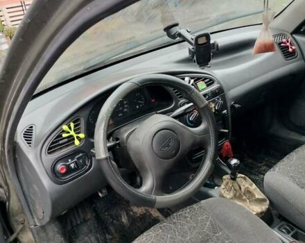 Зеленый Дэу Ланос, объемом двигателя 1.5 л и пробегом 257 тыс. км за 1250 $, фото 3 на Automoto.ua